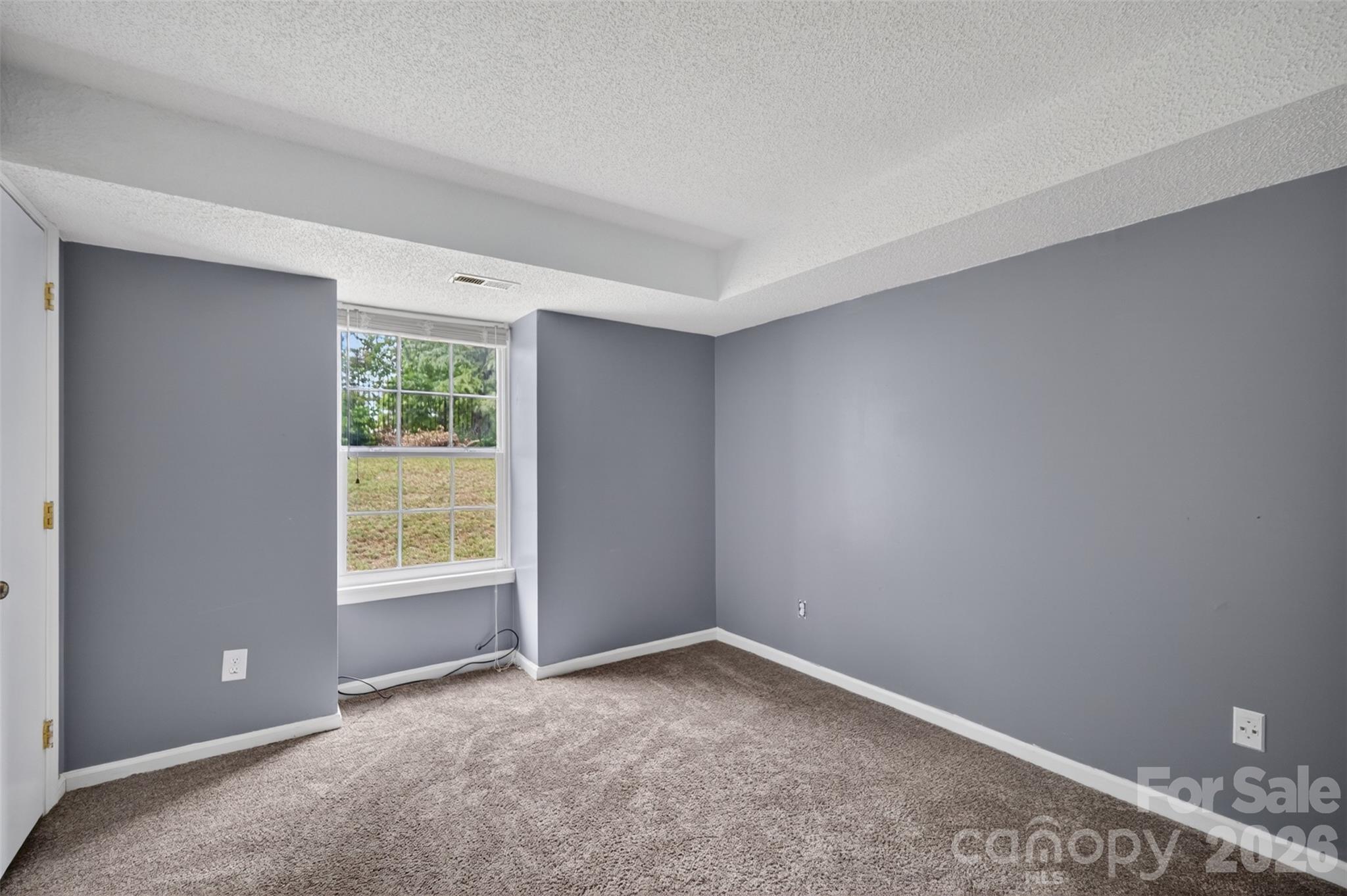 9405 Old Concord Road, Unit C Charlotte, NC 28213 - Photo 14 of 27 an empty room with a window