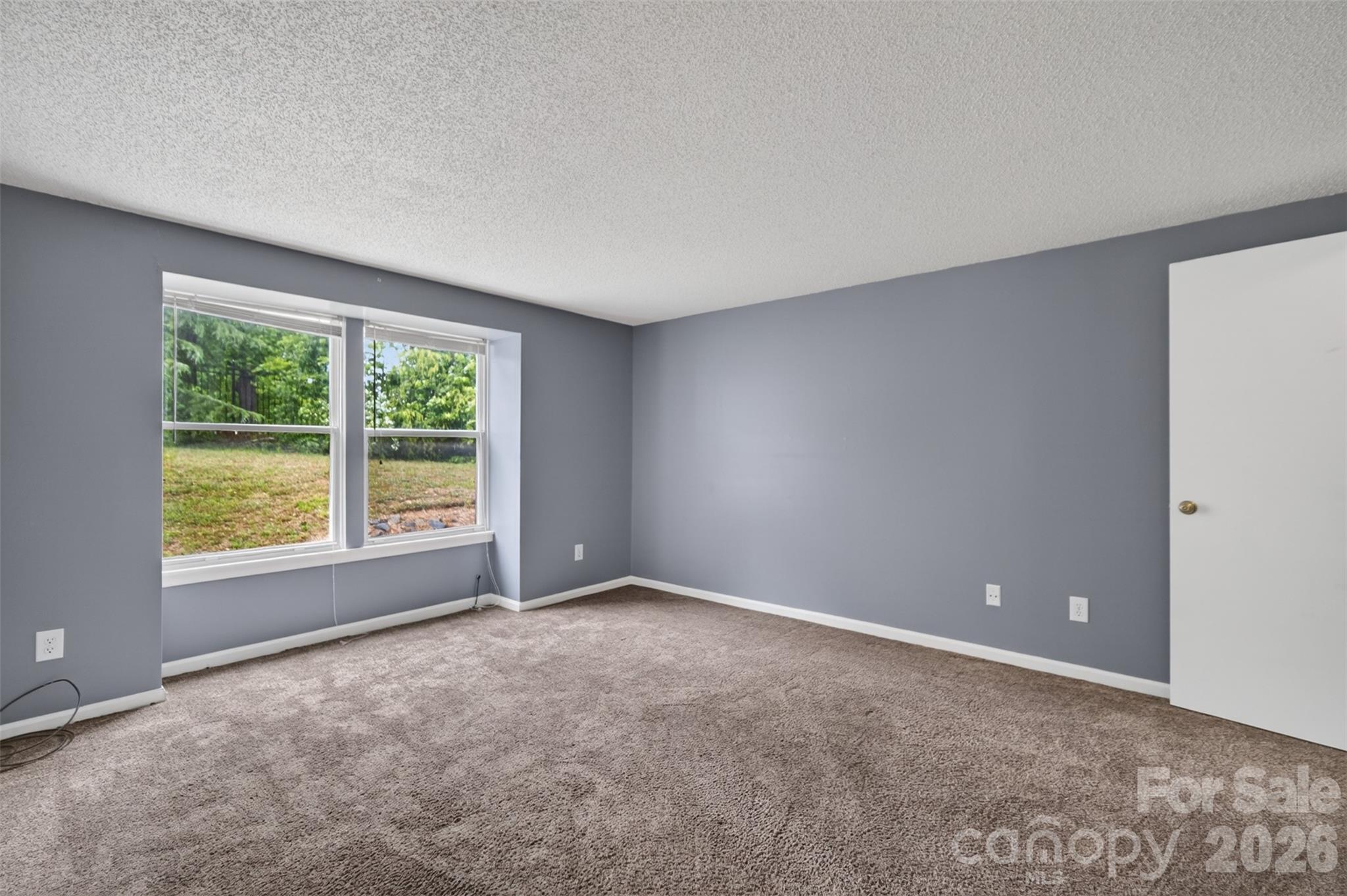 9405 Old Concord Road, Unit C Charlotte, NC 28213 - Photo 18 of 27 an empty room with a window