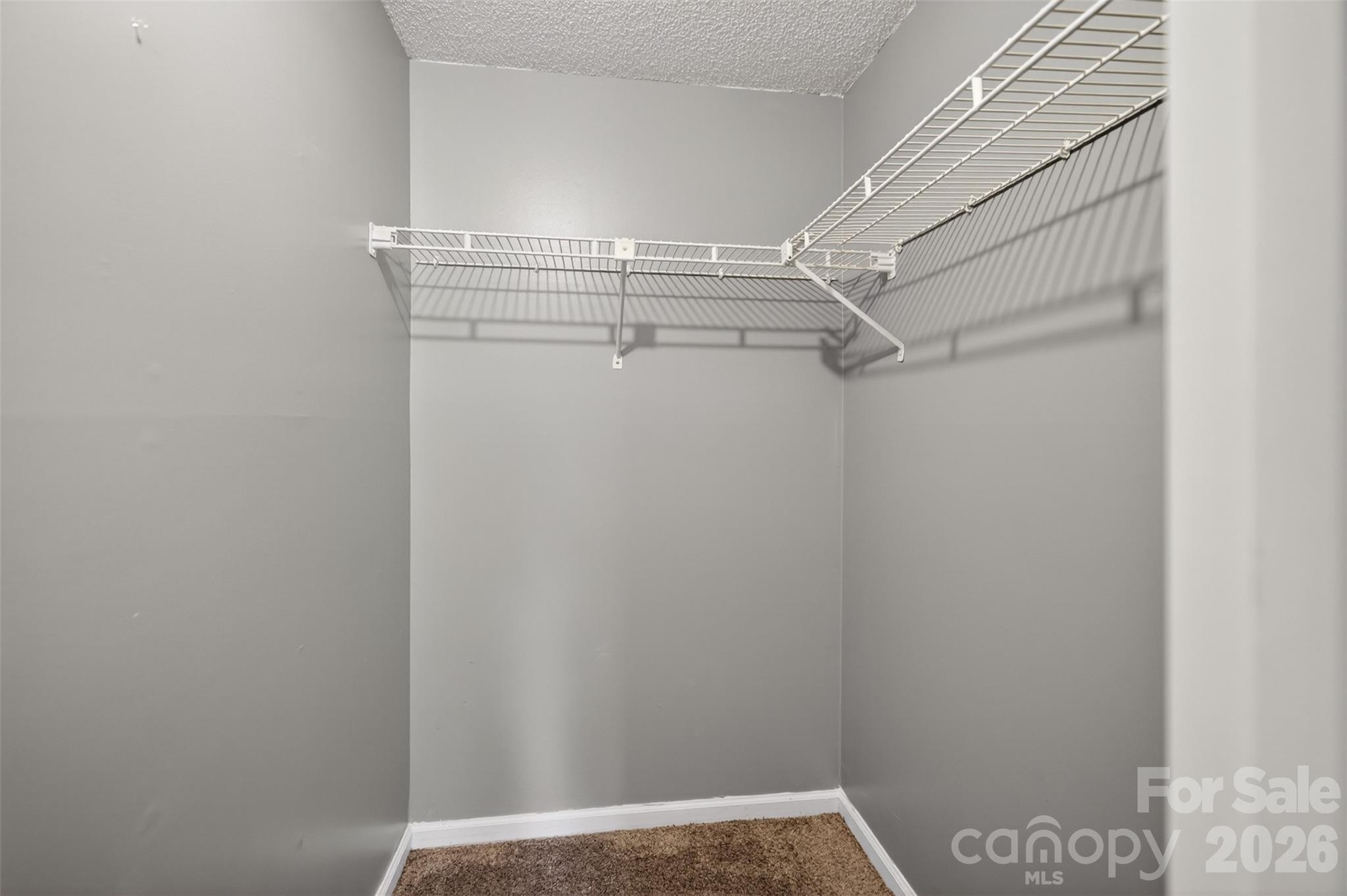9405 Old Concord Road, Unit C Charlotte, NC 28213 - Photo 20 of 27 a view of a room with racks on the wall