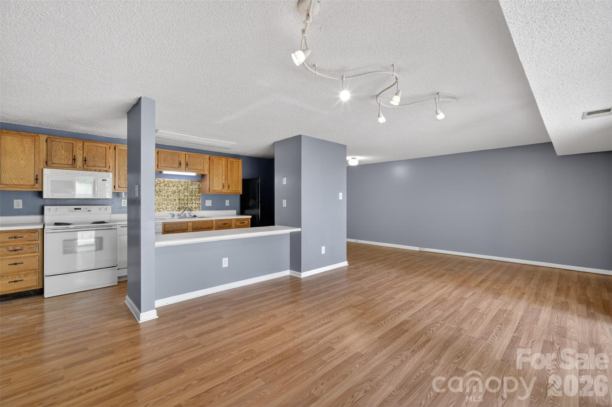 9405 Old Concord Road, Unit C Charlotte, NC 28213 - Photo 5 of 27 a view of an empty room with a window