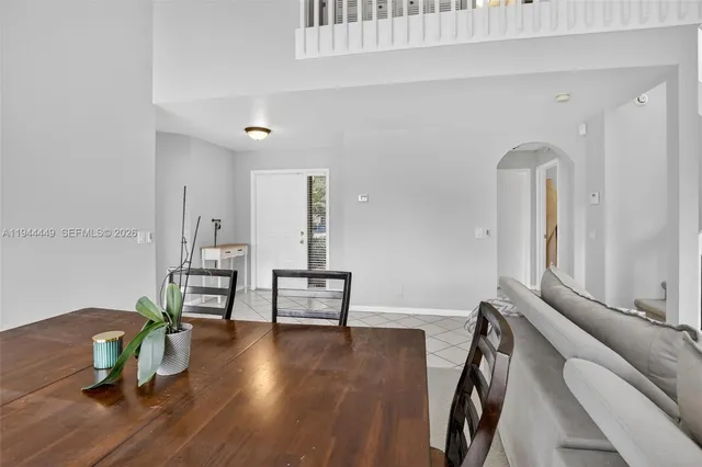 a view of a livingroom with furniture and wooden floor