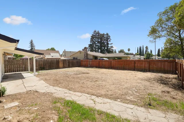 a street view with wooden fence