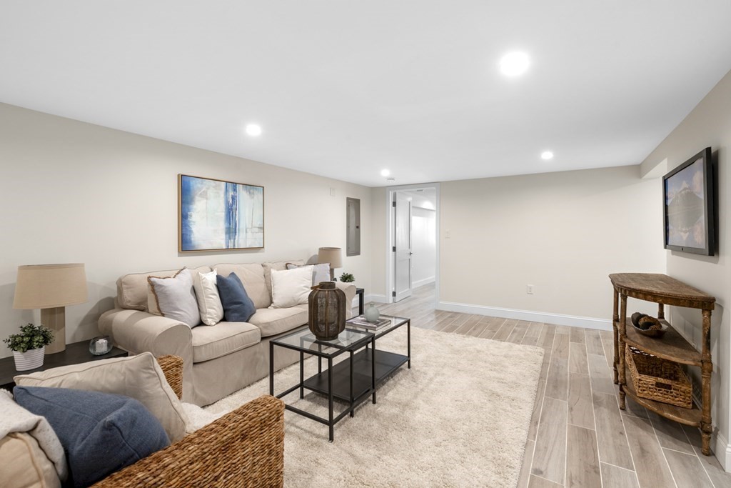 14 Colgate Road Marblehead, MA 01945 - Photo 30 of 35 a living room with furniture and a wooden floor