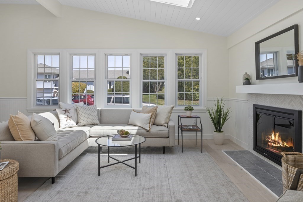 14 Colgate Road Marblehead, MA 01945 - Photo 3 of 35 a living room with furniture and a fireplace