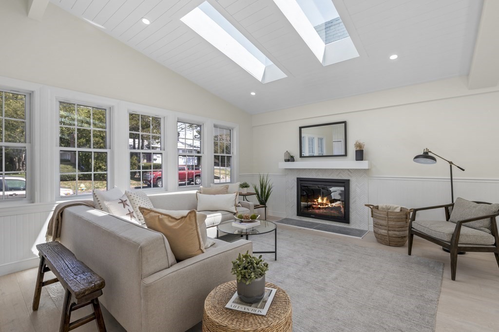 14 Colgate Road Marblehead, MA 01945 - Photo 4 of 35 a living room with furniture and a fireplace
