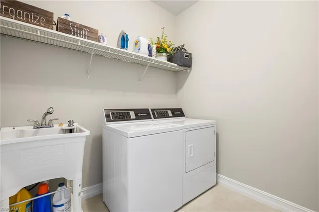 a kitchen with a table and chairs