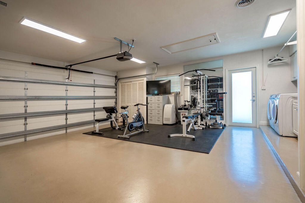 4450 Northeast 24th Terrace Lighthouse Point, FL 33064 - Photo 28 of 47 a view of a room with gym equipment