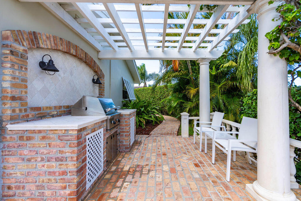 4450 Northeast 24th Terrace Lighthouse Point, FL 33064 - Photo 39 of 47 a outdoor space with chairs
