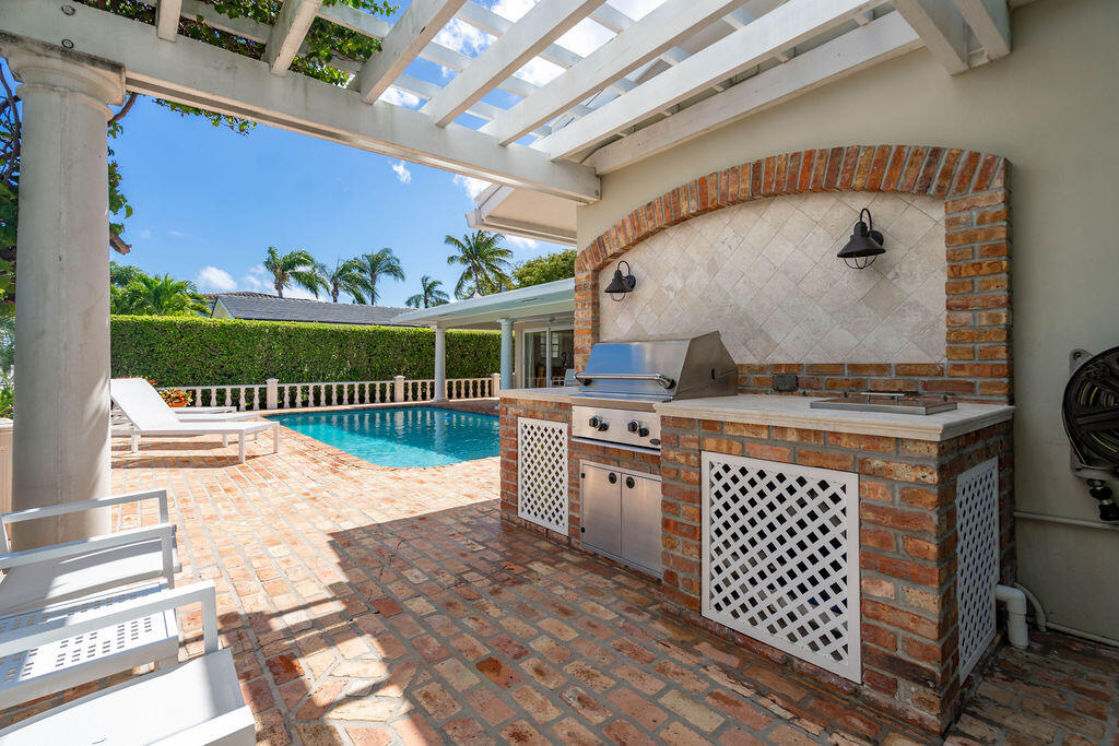 4450 Northeast 24th Terrace Lighthouse Point, FL 33064 - Photo 41 of 47 a view of a balcony with wooden floor