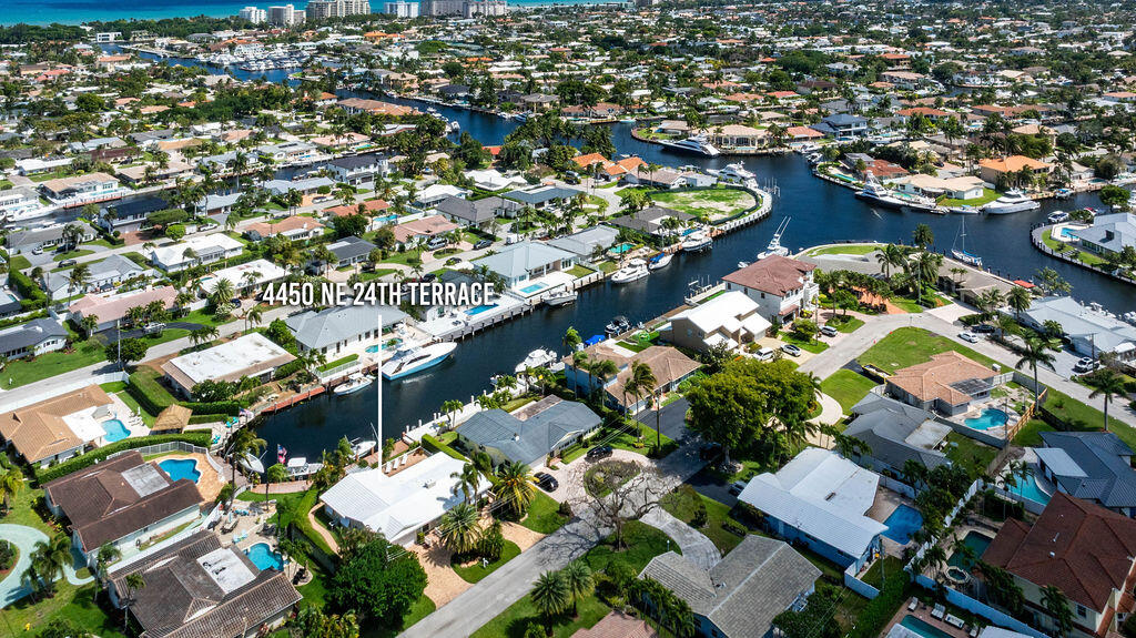 4450 Northeast 24th Terrace Lighthouse Point, FL 33064 - Photo 47 of 47 an aerial view of residential houses with outdoor space