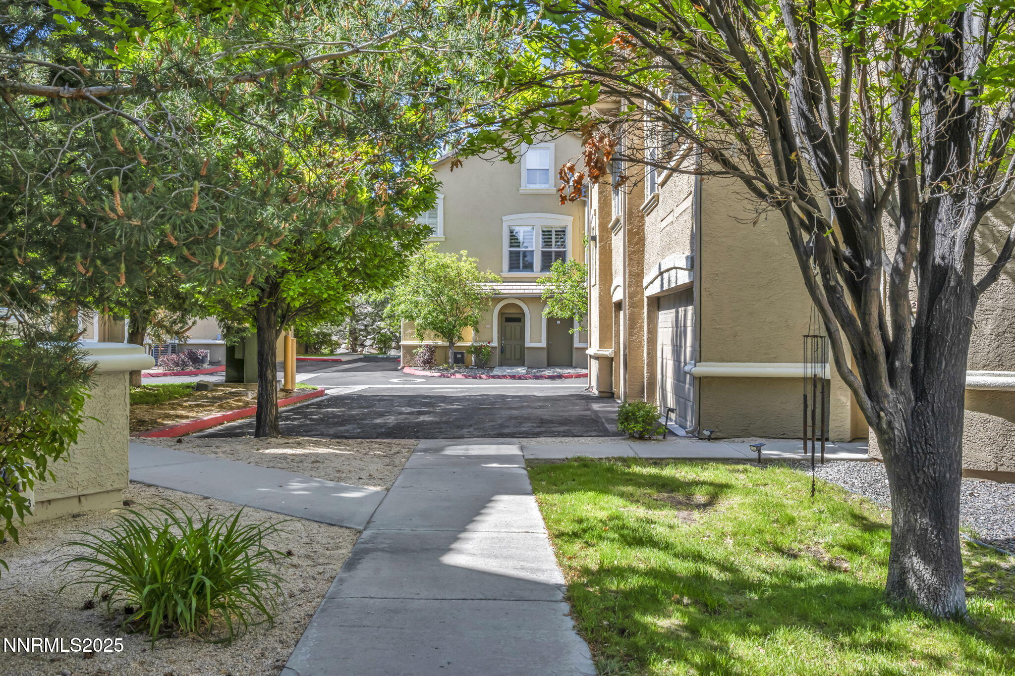 9050 Double R Boulevard, Unit 1123 Reno, NV 89521 - Photo 10 of 39 a view of a house with a yard