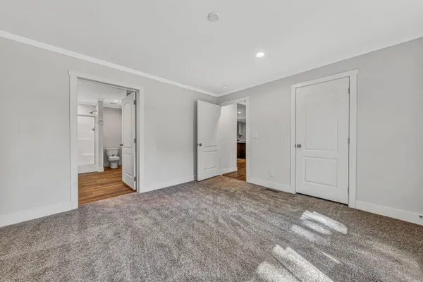 a bathroom with a double vanity sink and mirror