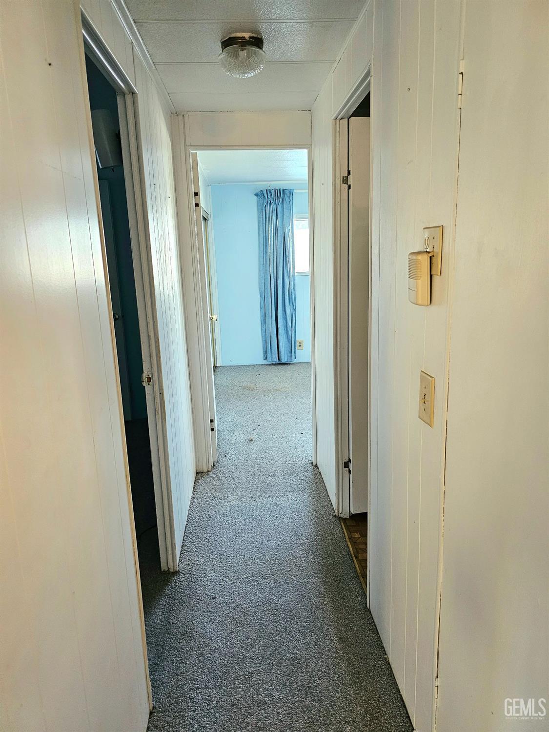 Undisclosed Address Anaheim, CA 92801 - Photo 8 of 8 wooden view of a hallway with wooden floor