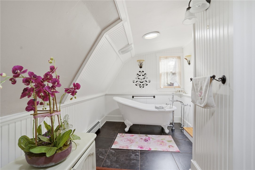 186 Arcadia Road Hopkinton, RI 02832 - Photo 20 of 27 Showcasing a serene bathroom featuring a comfortable and inviting soaking tub, perfect for relaxation and rejuvenation.
