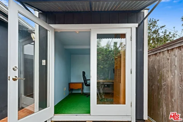 a view of a house with porch and sitting area