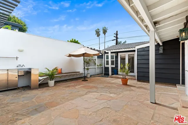 a view of a terrace with sitting area