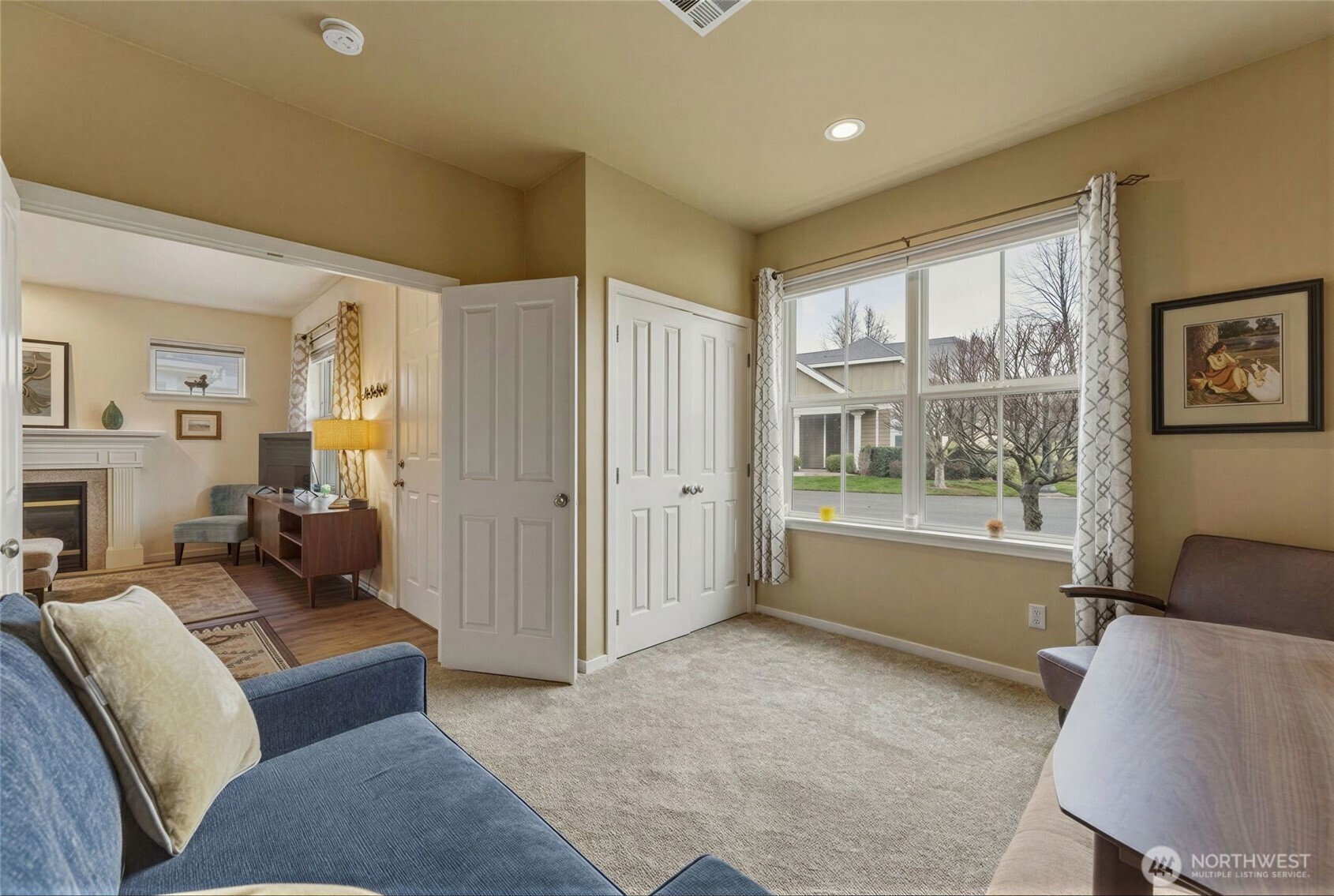 764 Southeast Quail Run College Place, WA 99324 - Photo 14 of 40 a living room with furniture and a window