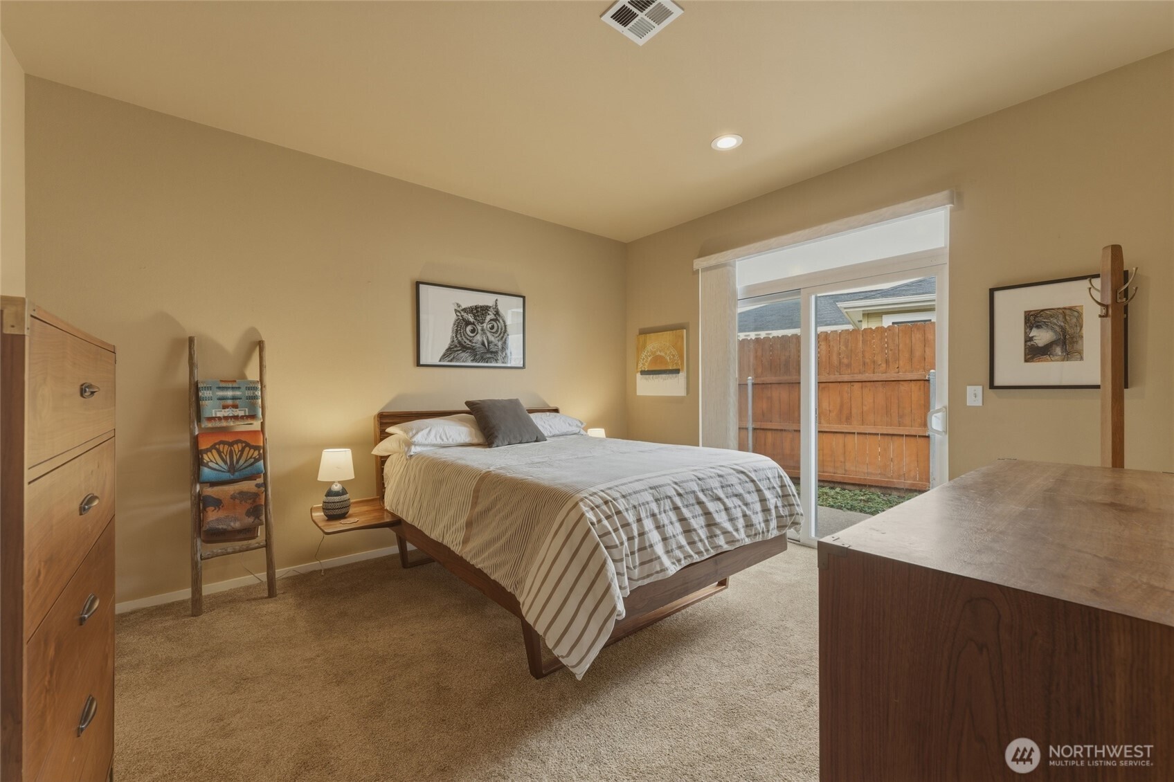 764 Southeast Quail Run College Place, WA 99324 - Photo 16 of 40 a bedroom with a bed and a desk