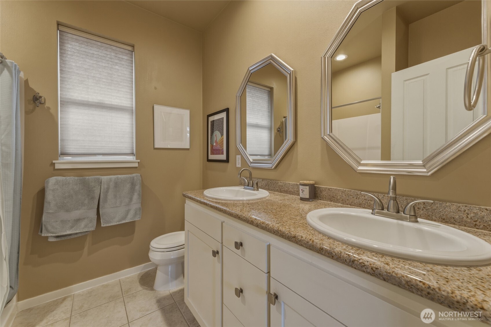764 Southeast Quail Run College Place, WA 99324 - Photo 18 of 40 a bathroom with a granite countertop sink toilet and mirror