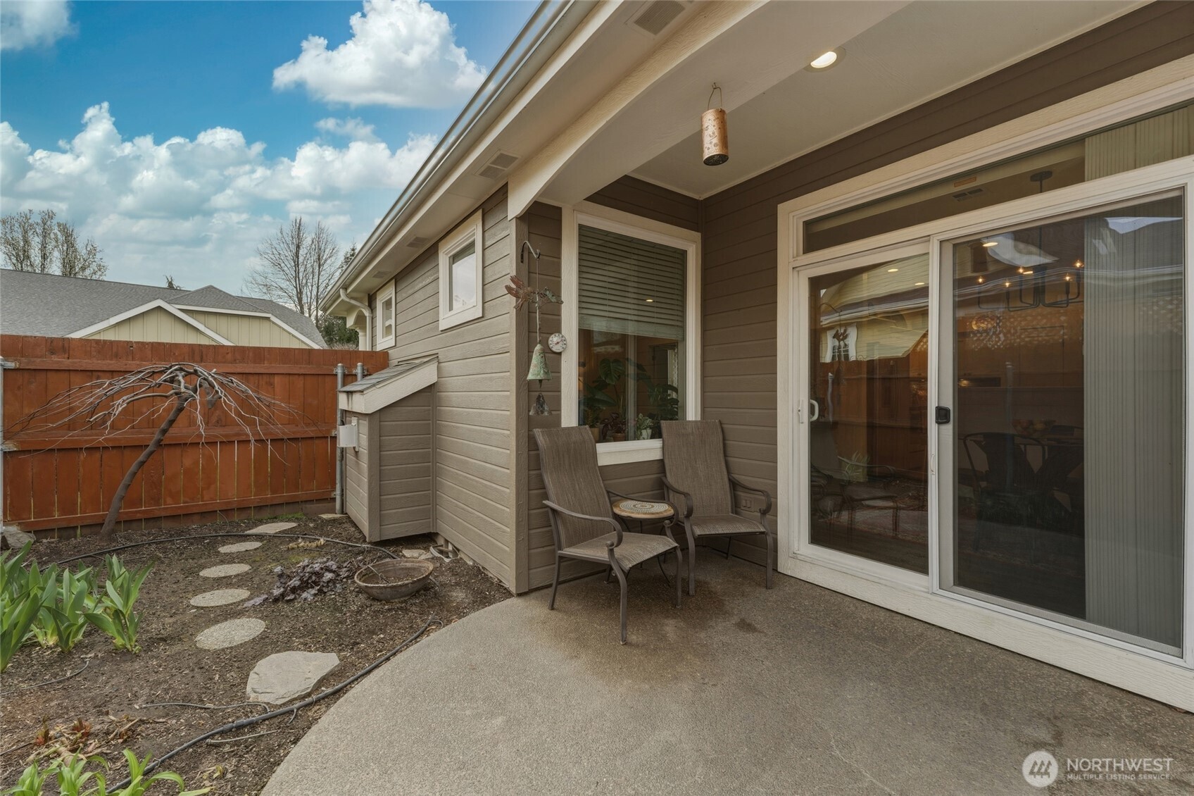 764 Southeast Quail Run College Place, WA 99324 - Photo 21 of 40 a view of a patio with chair and tables