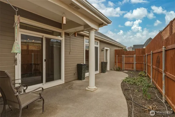 a view of a porch with seating space