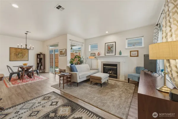 a living room with furniture or couch and a fireplace