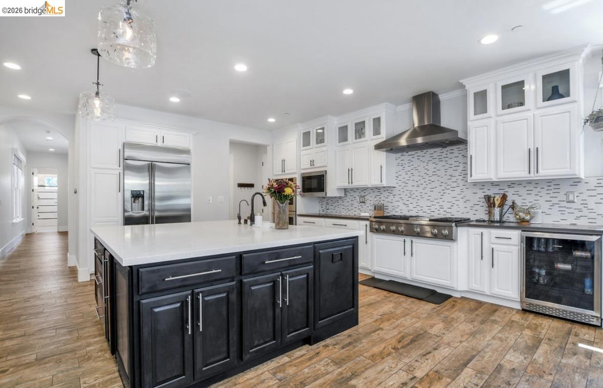 1605 Lone Oak Road Brentwood, CA 94513 - Photo 14 of 55 a kitchen with stainless steel appliances granite countertop a sink stove and cabinets