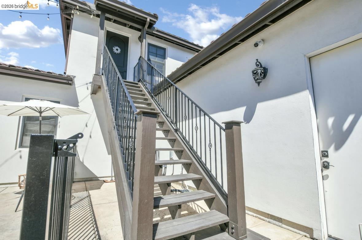 1605 Lone Oak Road Brentwood, CA 94513 - Photo 49 of 55 a view of staircase with railing and white walls