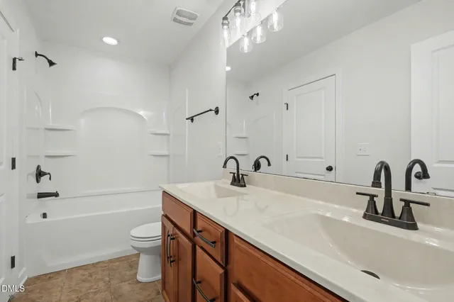 $890,000 | 5509 Weston Downs Drive, Durham, NC 27707