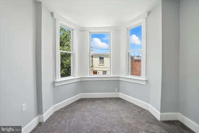 an empty room with a window