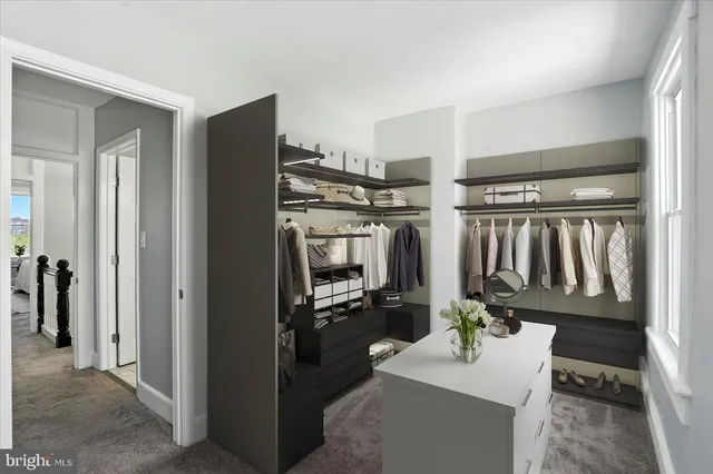 a room with multiple dryer and washer