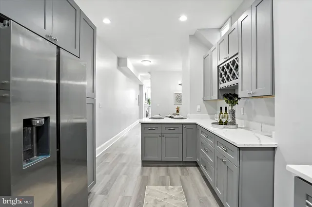 a large bathroom with a double vanity sink and a mirror