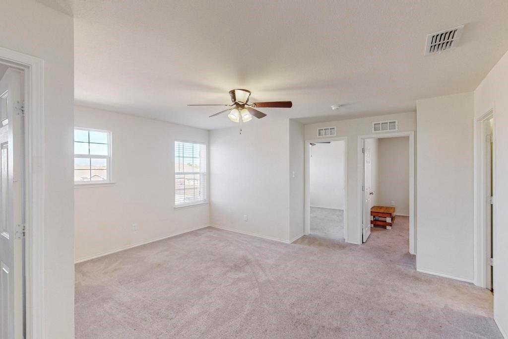 1103 Brazoria Road Forney, TX 75126 - Photo 19 of 25 a view of empty room with window and ceiling fan