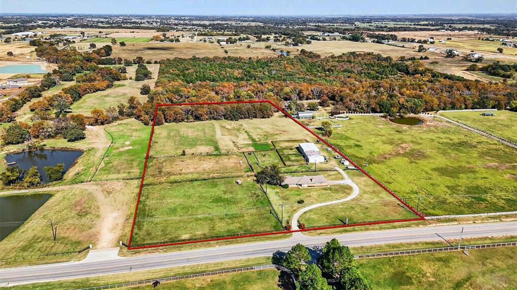 1937 Spring Hill Road Aubrey, TX 76227 - Photo 1 of 30 an aerial view of residential houses with outdoor space