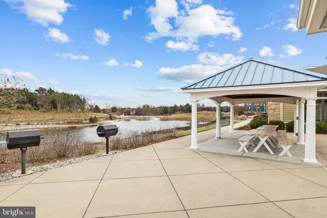 a view of a building with a yard