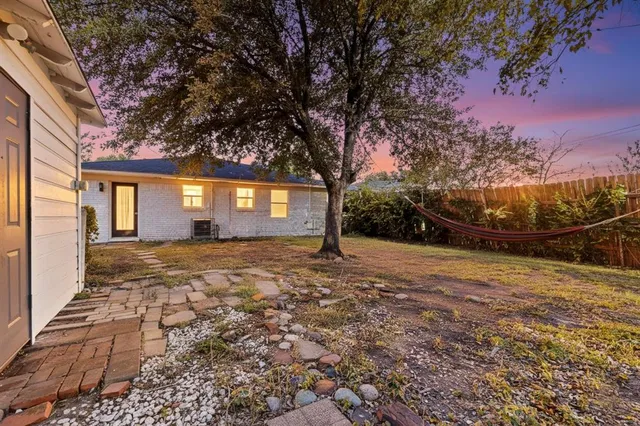 a view of a backyard of a house