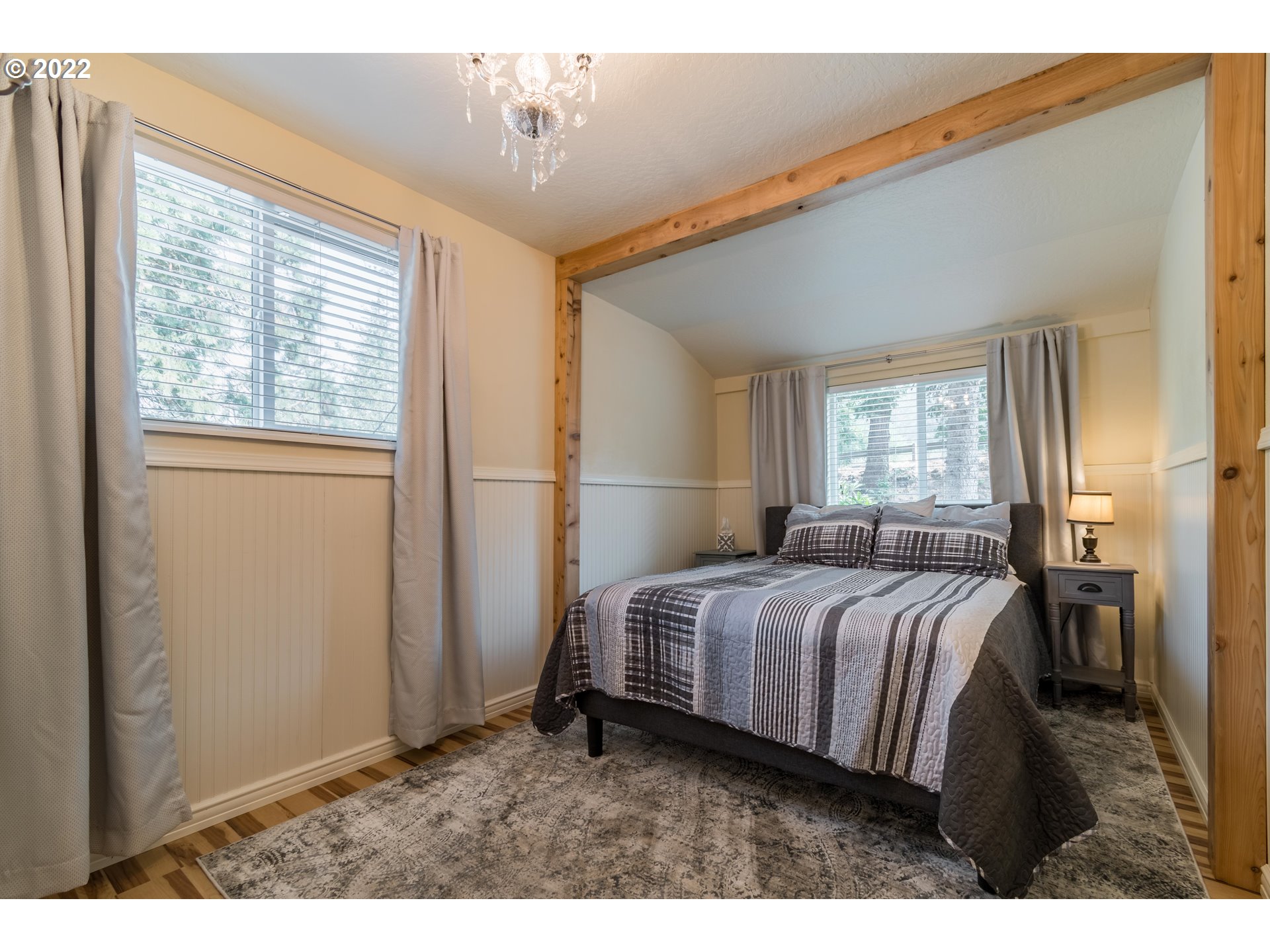 86710 Bailey Hill Road Eugene, OR 97405 - Photo 14 of 32 a bedroom with a bed and a window