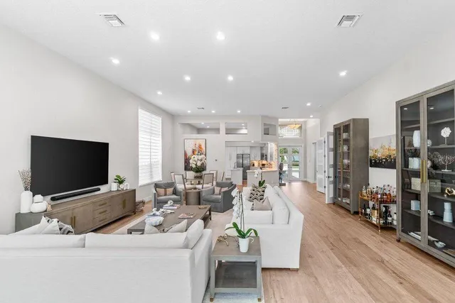 a view of a room that has a bed and a window