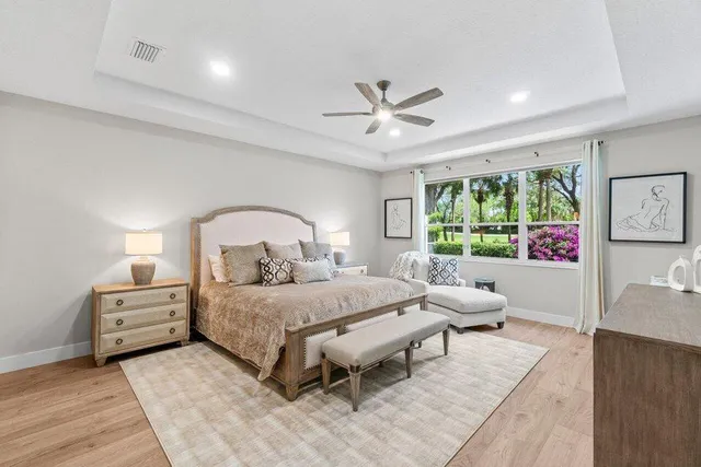 a large kitchen with a lot of counter space and a sink
