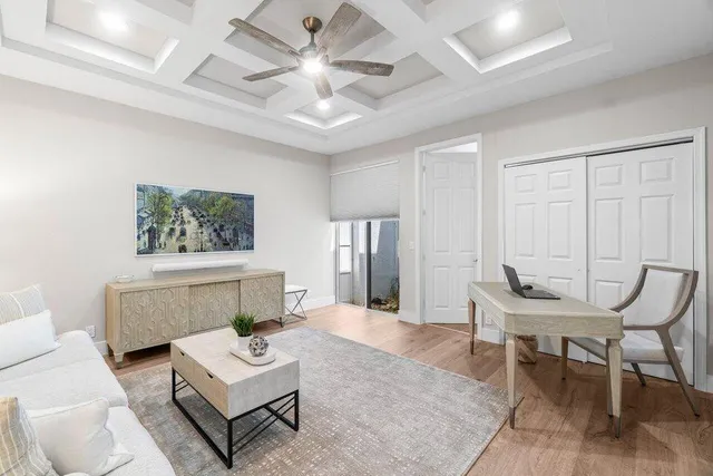 a bathroom with a double vanity sink toilet mirror and shower