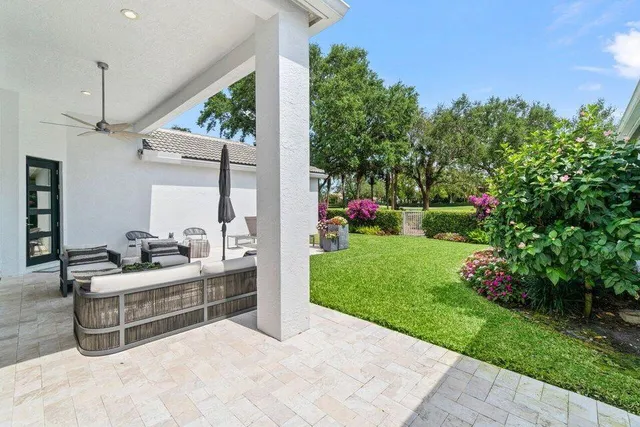 a front view of a house with patio