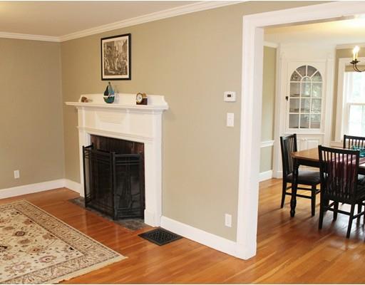 79 Robbins Road Lexington, MA 02421 - Photo 4 of 17 a view of a livingroom with furniture and a fireplace