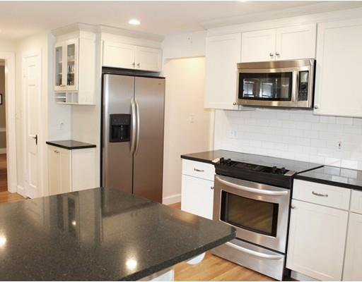 79 Robbins Road Lexington, MA 02421 - Photo 8 of 17 a kitchen with a stove and a microwave