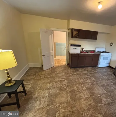 a room with furniture and a chair