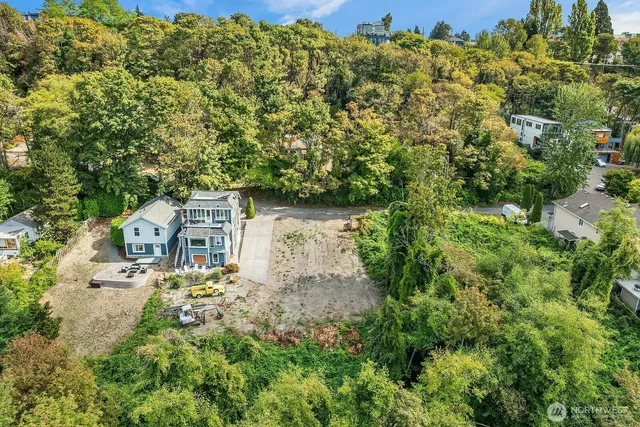 an aerial view of residential house with outdoor space