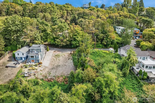 an aerial view of residential house with outdoor space