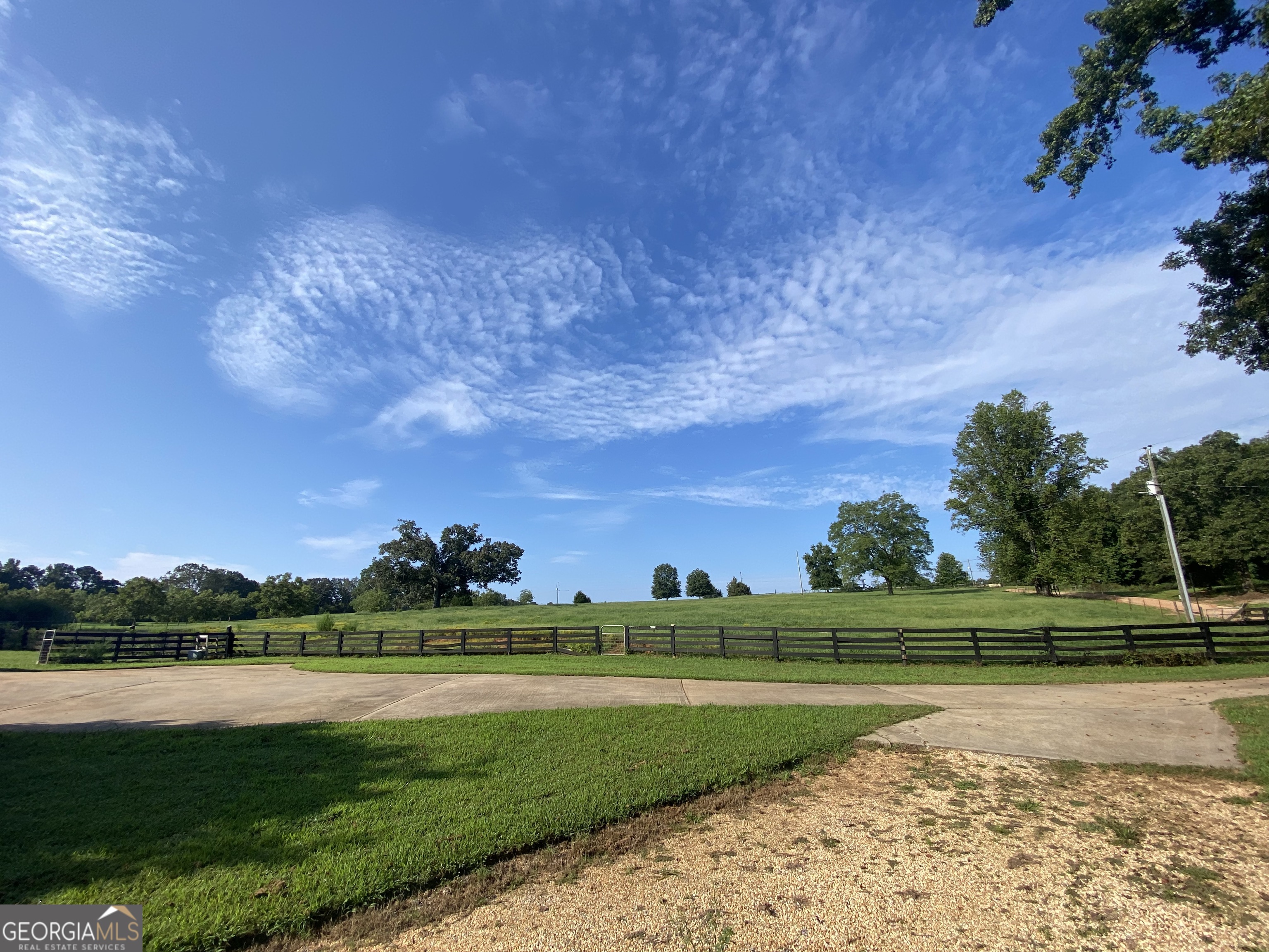 2223 Salem Road Watkinsville, GA 30677 - Photo 51 of 63 a view of a golf course with a lake