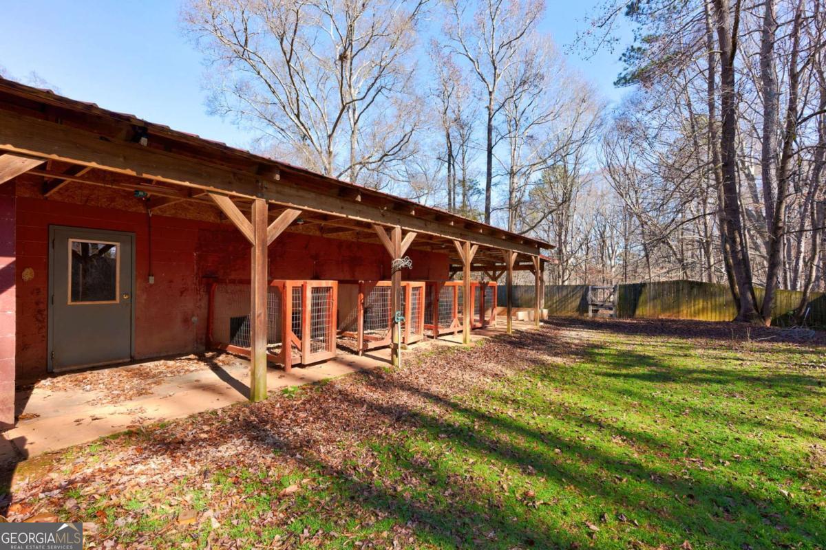 2223 Salem Road Watkinsville, GA 30677 - Photo 57 of 63 a view of a house with a yard covered in snow