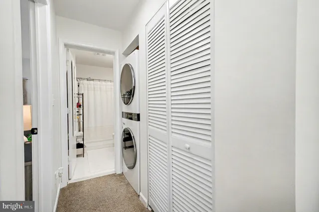 a view of a bathroom from a hallway