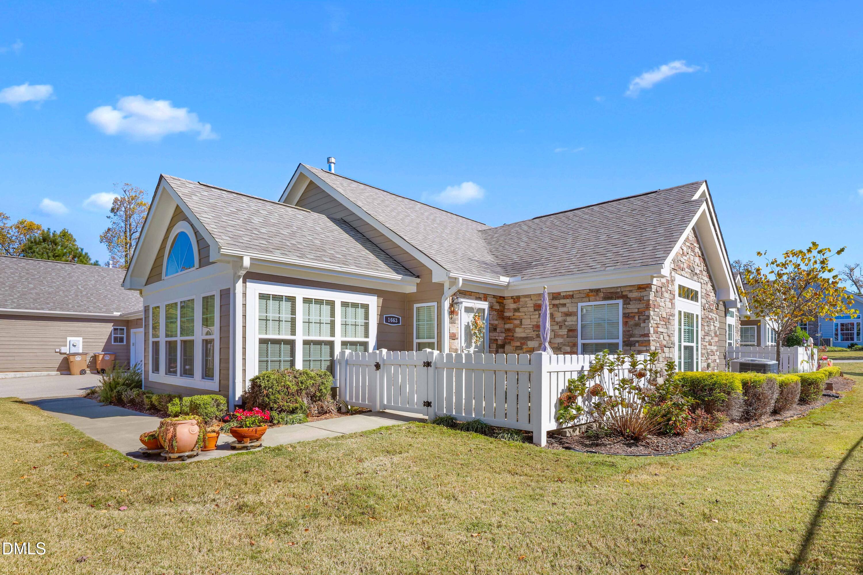1663 Winter Wren Circle Wake Forest, NC 27587 - Photo 25 of 31 a view of a house with backyard porch and sitting area